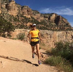 Photo of Becky Aaronson running down Bright Angel Trail in the Grand Canyon