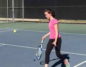 Miss O chasing down a drop shot. I love playing tennis with my sweet bug. She's been playing since she was 4 and can now run me all over the court.